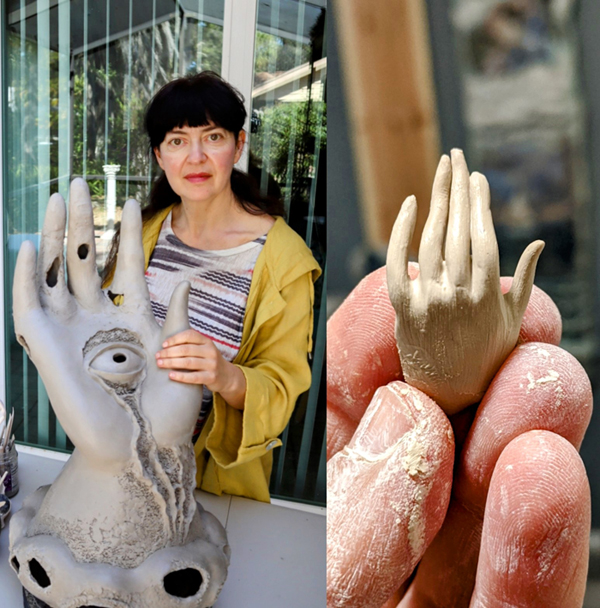 Natasha Dikareva with large and tiny hand sculptures